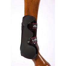 Laden Sie das Bild in den Galerie-Viewer, tendon boots | ship skin | tendon boots protection | Makebe | Horse accessories | Technical | riding accessories | equestrian | tendons protection | riding | lycra edging | avoid sores | breathable | neoprene | TPU | protection | ventilation | triple adjustement | elastic straps | central insert interchangeable | black |